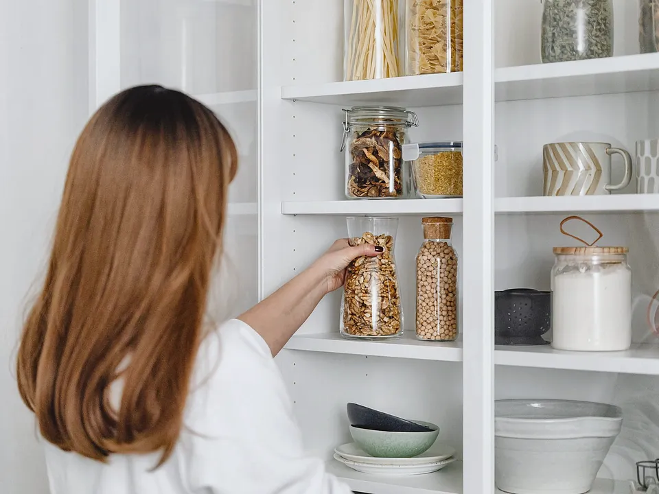 Glass jars on open kitchen shelves