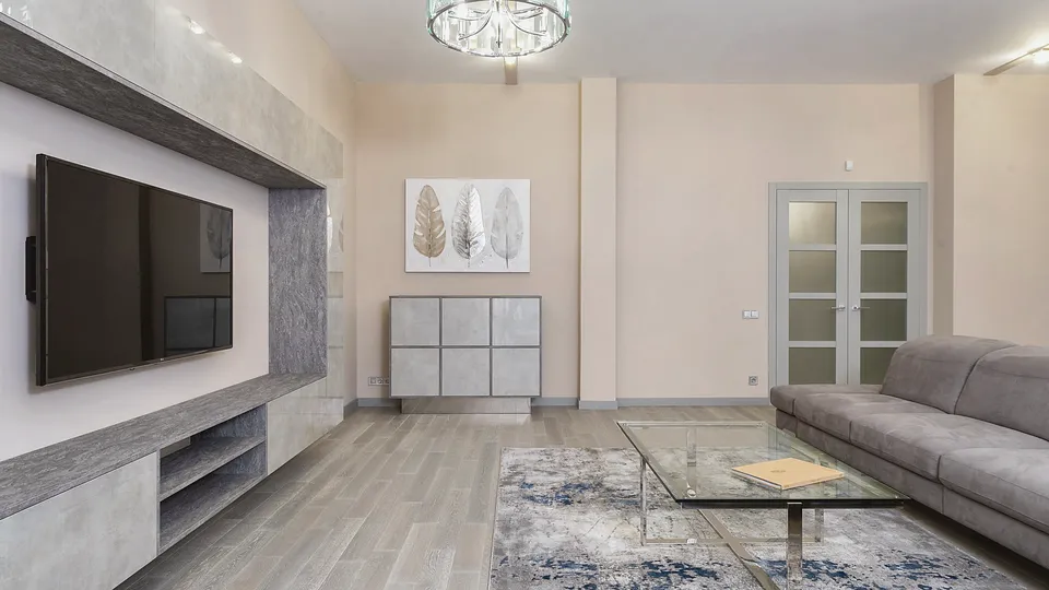 Living room with a wall-mounted TV