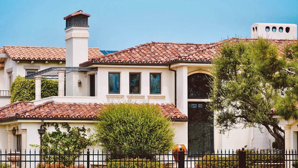 Spanish-style stucco homes with red tile roofs