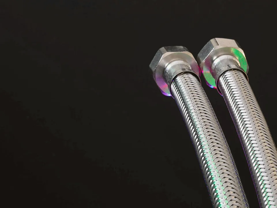 Two braided stainless supply lines