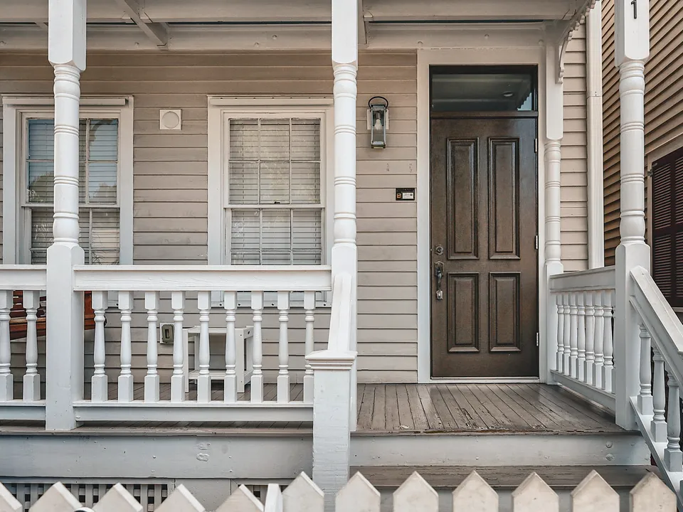 Covered front porch and entry door