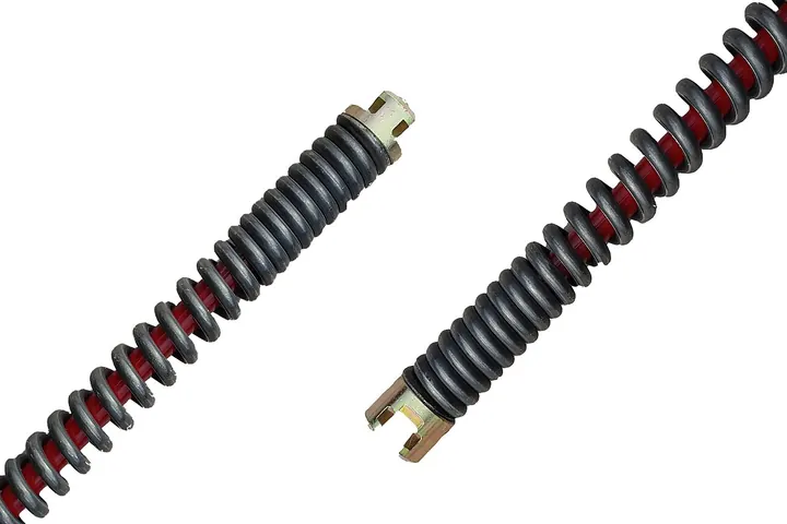 Two drain cleaning cable spring heads side by side