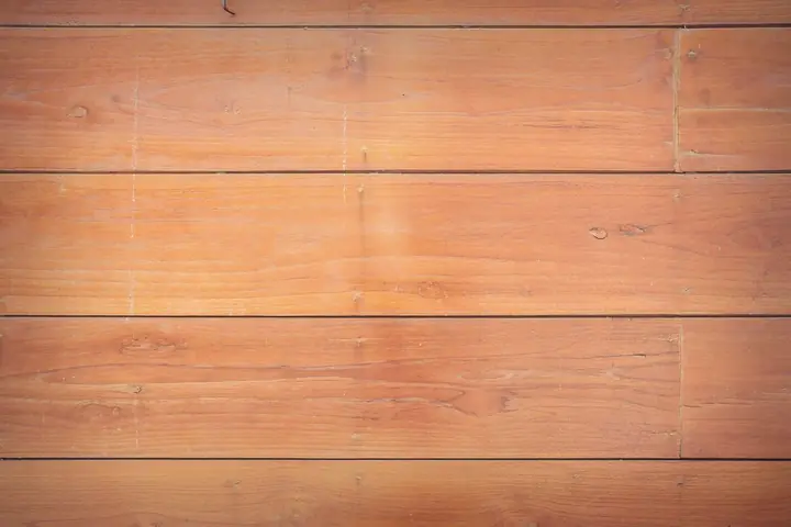 Textured wooden planks create a natural and rustic background for various applications